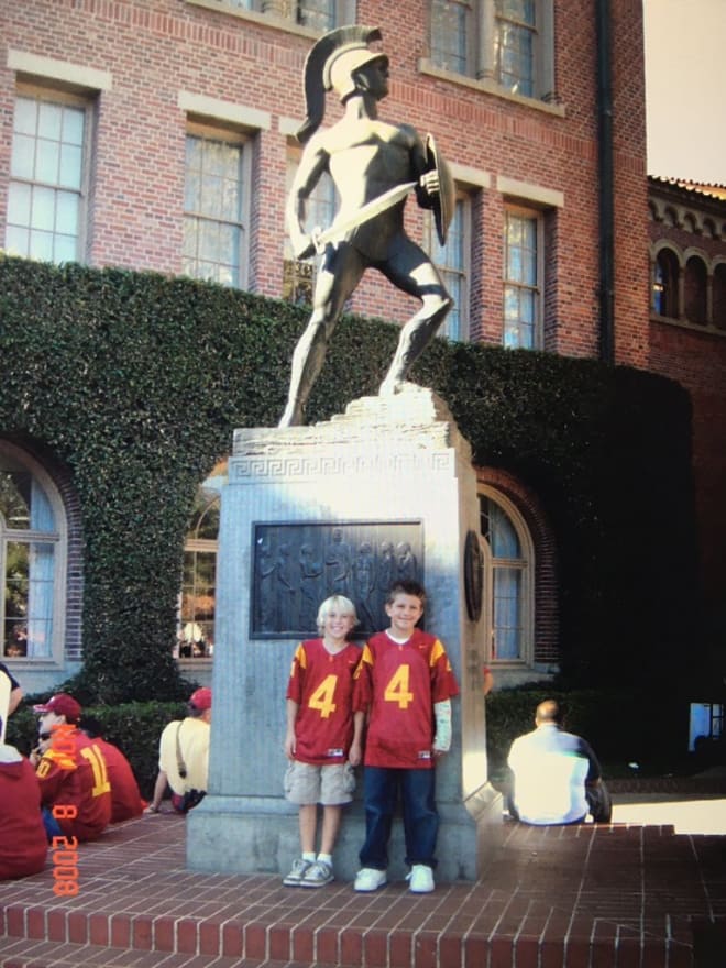 Nick Figueroa, right, posting in front of Tommy Trojan before a USC-Cal game in 2008.