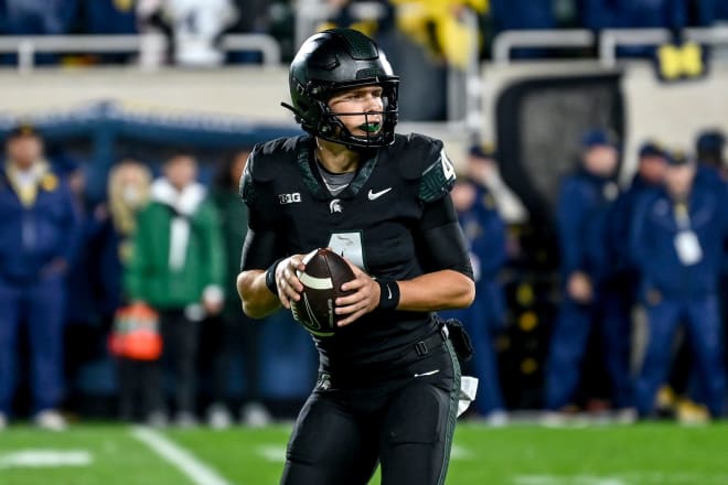 Michigan State's Sam Leavitt looks to throw against Michigan during the fourth quarter on Saturday, Oct. 21, 2023, at Spartan Stadium in East Lansing. © Nick King/Lansing State Journal / USA TODAY NETWORK
