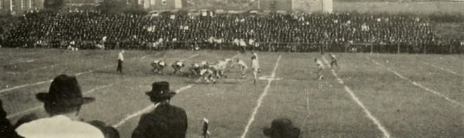 This photograph was taking during the 1919 game between NC State and UNC, the beginning of the annual series between the two schools.