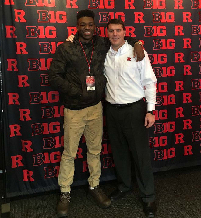Barrow poses with head coach Chris Ash while on campus yesterday