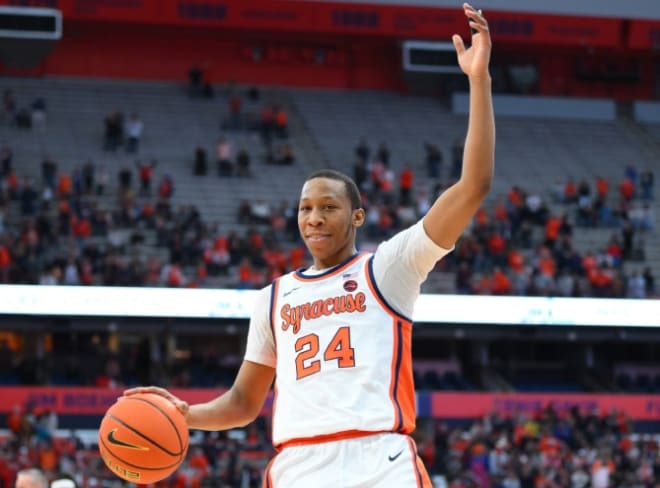 Dec 30, 2023; Syracuse, New York, USA; Syracuse Orange guard Quadir Copeland (24) gestures to the crowd against the Pittsburgh Panthers during the second half at the JMA Wireless Dome. Mandatory Credit: Rich Barnes-USA TODAY Sports