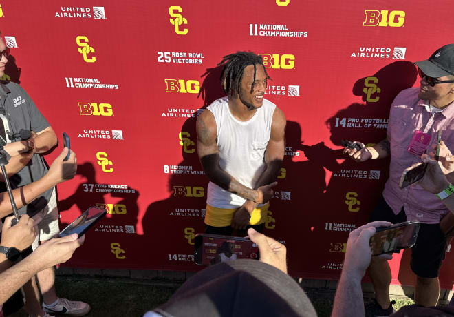 Defensive back Jaylin Smith talks with media Wednesday after practice.