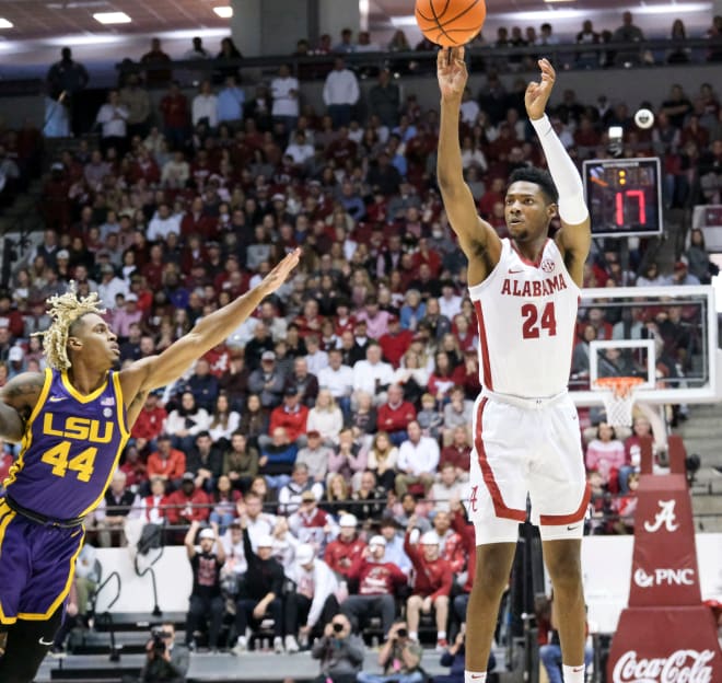 LSU Tigers guard Cam Hayes (1) tries to make a move against