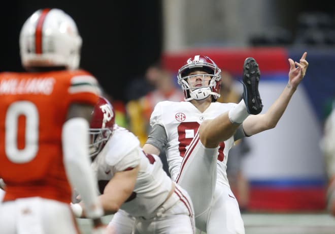 James Burnip watches a punt during Alabama's game against Miami at Mercedes-Benz Stadium in 2021. 