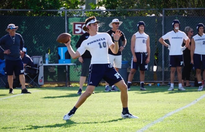 JD Johnson throws a pass during 7-on-7 competition last summer.  (Photo by Ralph Amsden)