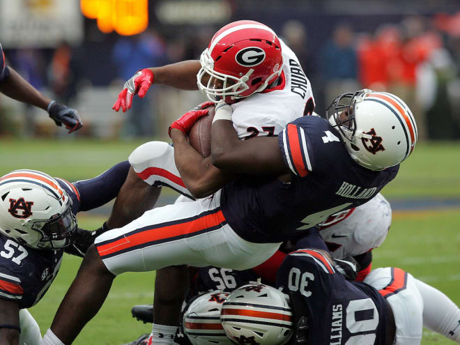 Jeff Holland drops Nick Chubb for a short gain.