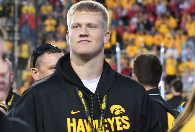 Offensive lineman Ezra Miller will be starting classes at Iowa in January.