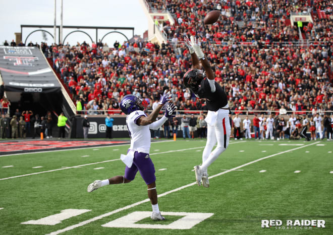DB Adrian Frye goes up to defend the pass against TCU. Photo Billy Watson.