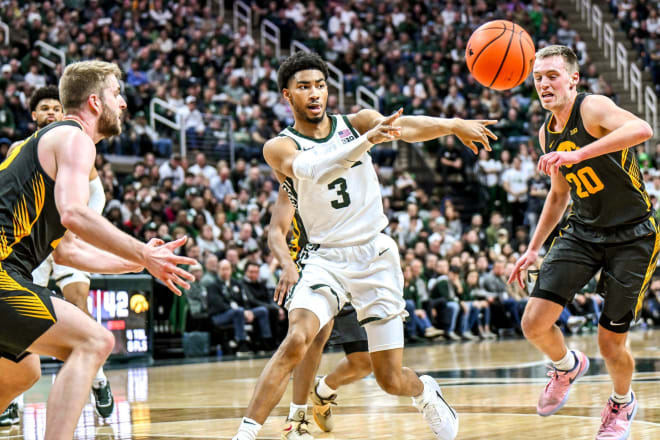 Michigan State's Jaden Akins passes the ball against Iowa during the first half on Tuesday, Feb. 20, 2024, at the Breslin Center in East Lansing.