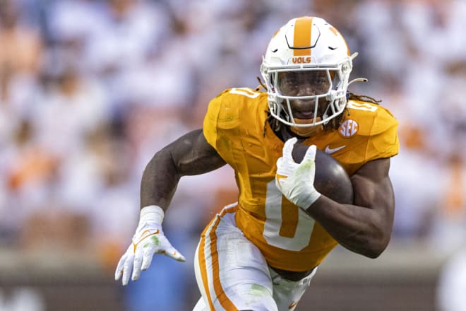 Tennessee running back Jaylen Wright (0) runs for yardage during the second half of an NCAA college football game against Texas A&M Saturday, Oct. 14, 2023, in Knoxville, Tenn. (AP Photo/Wade Payne)