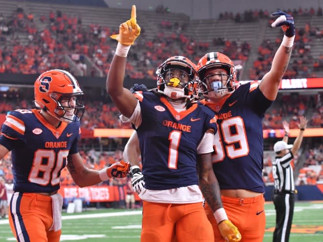 Sep 2, 2023; Syracuse, New York, USA; Syracuse Orange running back LaQuint Allen Jr (1) celebrates scoring a touchdown along with wide receiver Isaiah Jones (80) and tight end Dan Villari (89) in the first quarter against the Colgate Raiders at the JMA Wireless Dome. Mandatory Credit: Mark Konezny-USA TODAY Sports