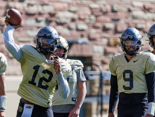 Colorado coach Karl Dorrell has not announced a decision on a starting quarterback between Brendon Lewis, left, and J.T. Shrout.