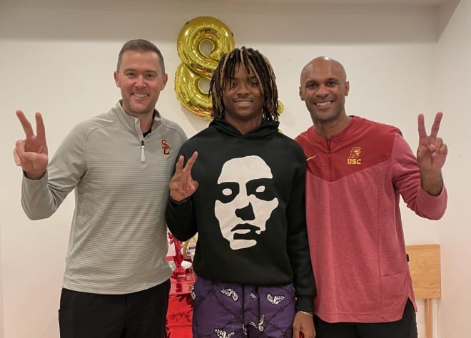 New USC defensive coordinator D'Anton Lynn, right, with four-star cornerback commit Isaiah Rubin and head coach Lincoln Riley