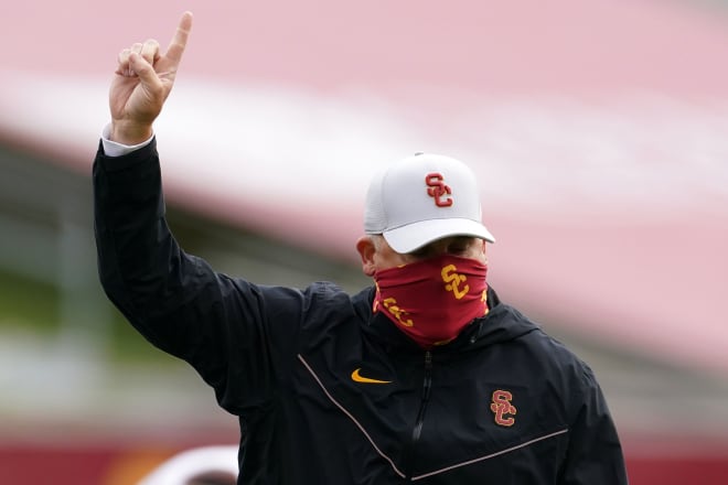 USC coach Clay Helton watched his team erase a 13-point deficit in the final minutes for a dramatic 28-27 win over Arizona State on Saturday.