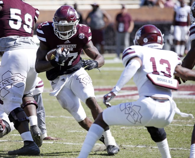  Aeris Williams (27) cuts in front of White defensive back Cameron Dantzler (13) during the first half of Mississippi State's Maroon and White spring game.