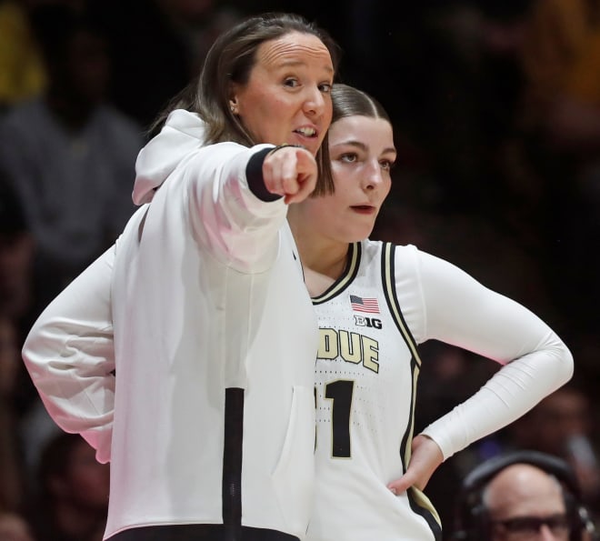 Purdue Boilermakers head coach Katie Gearlds talks to Purdue Boilermakers guard Sophie Swanson (31) during the NCAA women s basketball game against the Iowa Hawkeyes, Wednesday, Jan. 10, 2024, at Mackey Arena in West Lafayette, Ind.