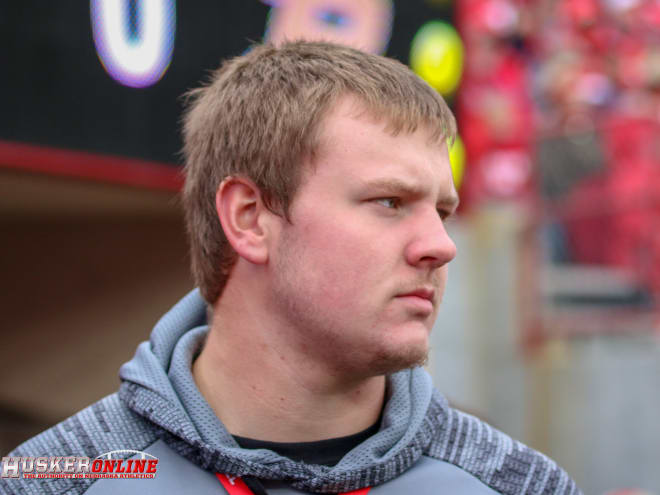 Class of 2020 offensive tackle Tyler Miller from Iowa takes in his first Husker game Saturday.
