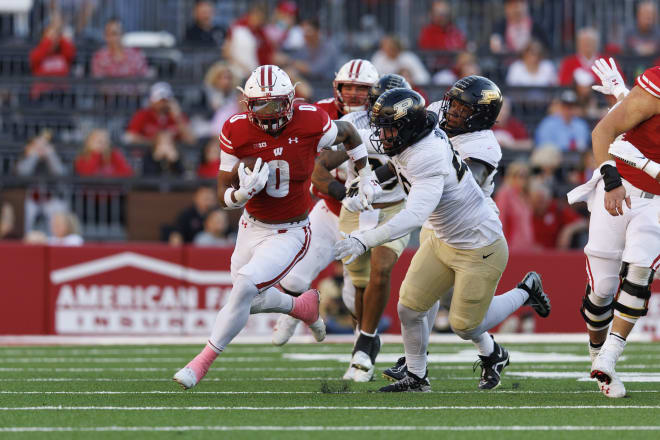 Oct 22, 2022; Madison, Wisconsin, USA; Wisconsin Badgers running back Braelon Allen (0) rushes with the football during the third quarter against the Purdue Boilermakers at Camp Randall Stadium. Mandatory Credit: Jeff Hanisch-USA TODAY Sports