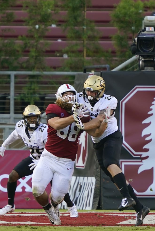 Junior outside linebacker Carson Wells fights to break up a pass vs. Stanford on Nov. 14