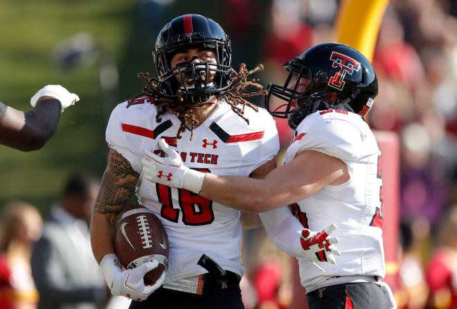 Texas Tech DB Thomas Leggett (16) celebrates a blocked punt and return for a touchdown against Iowa State on Saturday, Oct. 27, 2018, in Ames, Iowa. (AP Images/Charlie Neibergall)