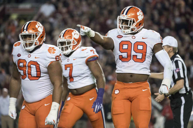Clelin Ferrell (99) and Dexter Lawrence (90)