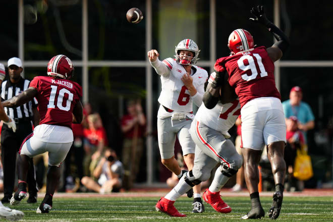 Cox attempts to defend a Kyle McCord pass during this year's matchup with Ohio State.