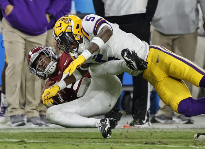 LSU safety Jay Ward tackles Alabama's Bryce Young in last year's 20-14 Crimson Tide win in Tuscaloosa. The 4-4 Tigers sacked Young four times and held Alabama to 6 yards rushing including minus 19 in the second half. Ward and the Tigers get another shot at Young, last year's Heisman Trophy winner, on Saturday night in Tiger Stadium.