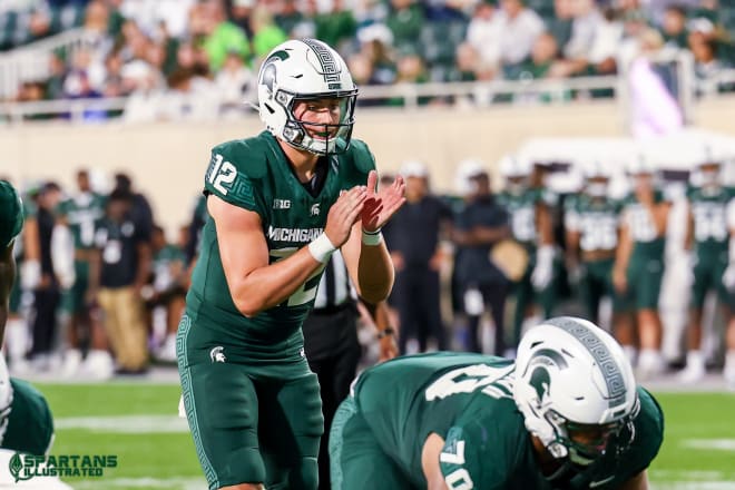 Michigan State offensive guard Kevin Wigenton II prepares to block for quarterback Katin Houser versus Washington on Sept. 16, 2023. 