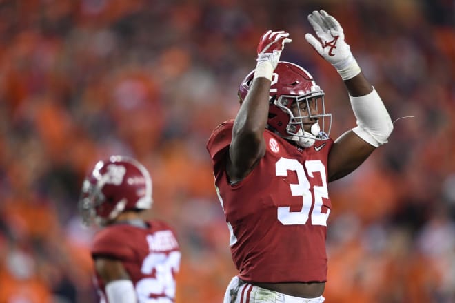 Alabama Crimson Tide linebacker Rashaan Evans (32) reacts during the second quarter against the Clemson Tigers in the 2017 College Football Playoff National Championship Game at Raymond James Stadium. Mandatory Credit: John David Mercer-USA TODAY Sports.