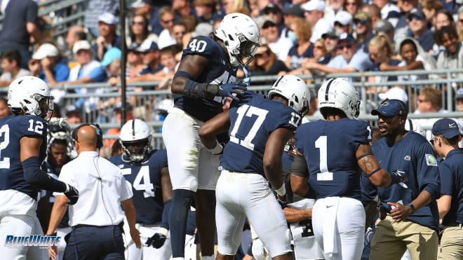 Penn State defensive ends Jesse Luketa and Arnold Ebiketie celebrate a play during the Nittany Lions' 37-18 win over Villanova. BWI photo/Steve Manuel
