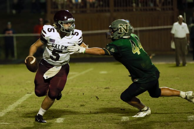 Former Northside standout Zach Horton (44), a James Madison tight end signee, reaches out to sack Salem’s Hunter Chaney during a game last season in Roanoke.