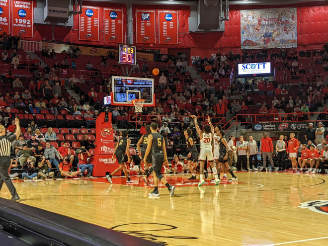 Dayvion McKnight shooting free throws at the line during the Hilltoppers' season opener against Alabama State.