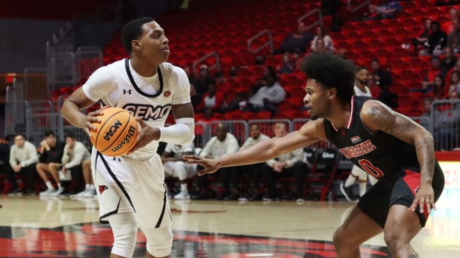 Nov. 19, 2021; Cape Girardeau, MO; Southeast Missouri State point guard Phillip Russell looks for an open teammate in a game against Arkansas State at the Show Me Center.