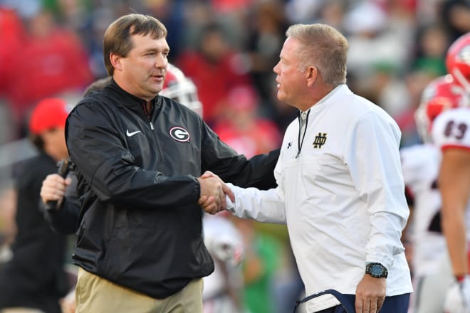 Brian Kelly and Kirby Smart shake hands before their last game in South Bend.