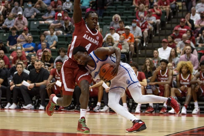 Drake Bulldogs forward Shanquan Hemphill (4) drives to the basket against the Alabama Crimson Tide forward Juwan Gary in the first half at HP Fieldhouse. Photo | USA TODAY