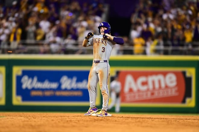 LSU center fielder Dylan Crews celebrates his two-run RBI double in the eighth inning in the final home at-bat of his career as the Tigers beat Kentucky to win the Super Regional.