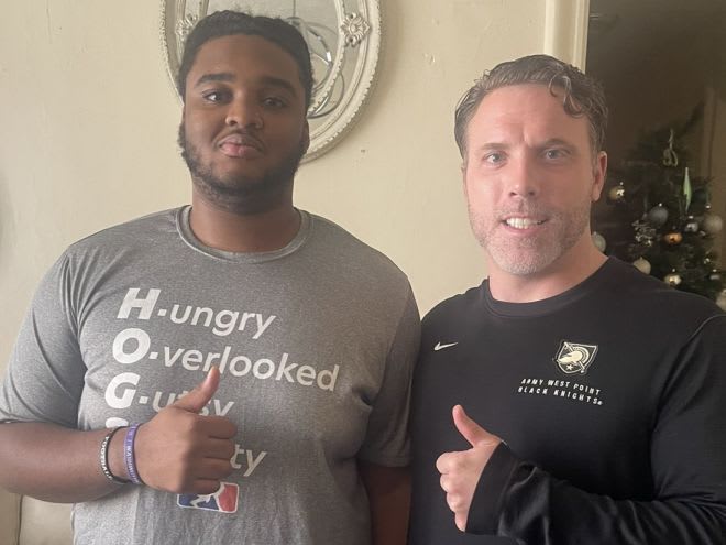 O-Lineman prospect Carmello Michel receiving a home-visit from Army O-Line Coach, Mike Viti