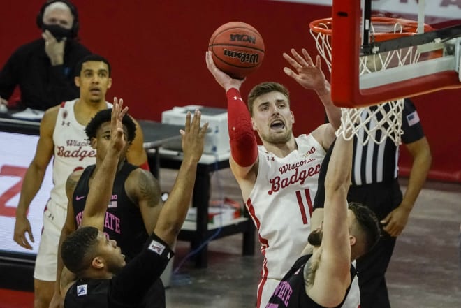 Wisconsin's Micah Potter shoots during the second half. He finished with 12 points and eight rebounds.