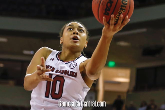 South Carolina's Allisha Gray eyes the rim as she goes up for a shot during the Gamecocks' 79-42 win over Maine Monday night at Colonial Life Arena.Gray finished with 10 points - one of five USC players in double figures.