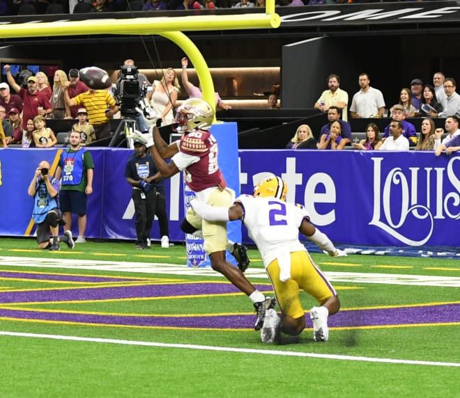 Ontaria Wilson hauls in one of his two touchdowns in FSU's win over LSU on Sunday.