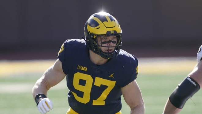 Michigan Wolverines football edge defender Aidan Hutchinson is receiving first-round NFL Draft buzz for 2022.