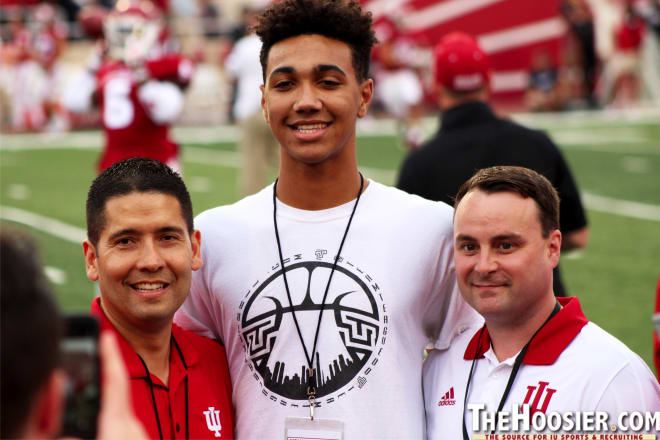 Greenwood (Ind.) Center Grove forward Trayce Jackson-Davis (center) poses with Archie Miller (right) and Tom Ostrom (left) at IU-Ohio State on Thursday night.