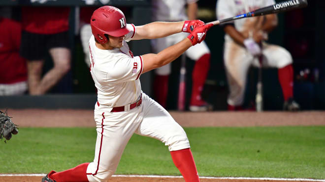 Sophomore infielder Max Anderson follows through on a pitch.