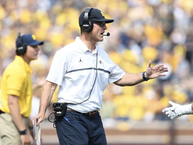 Michigan Wolverines football coach Jim Harbaugh is 3-3 against Michigan State in six meetings
