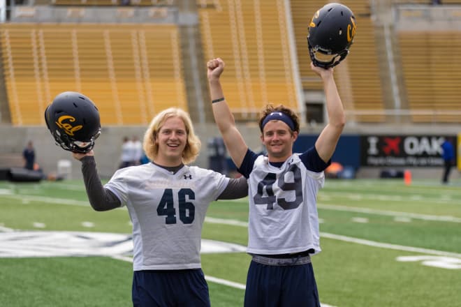 The happiest picture of kickers that you'll ever see, as Siemieniec and Landgrebe compete for the kicker spot