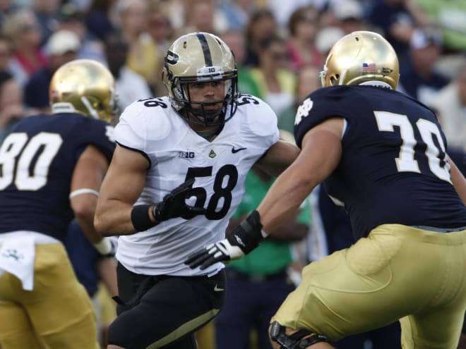 Robert Maci was a two-year starter at defensive end/linebacker. Some of his best memories were playing Notre Dame as he did in this 2012 image. 