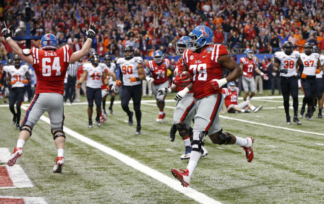 Ole Miss offensive tackle scores on a touchdown reception on the final play of the first half of the Rebels' 48-20 Allstate Sugar Bowl victory over Oklahoma State.