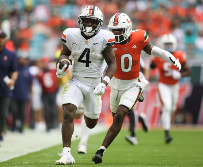 Hurricanes hold off Virginia 29-26 in OT