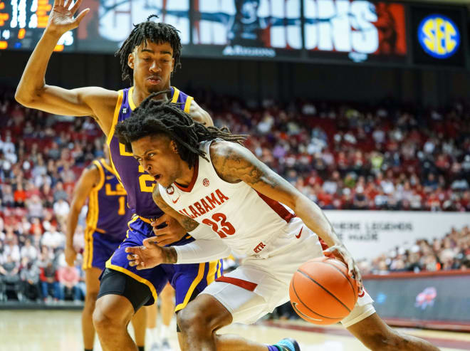 Alabama Crimson Tide guard John Petty Jr. (23) drives to the basket against LSU Tigers forward Trendon Watford (2) during the second half at Coleman Coliseum. Photo | Imagn