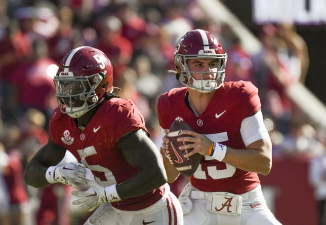 Alabama Crimson Tide quarterback Ty Simpson (15) fakes a handoff to running back Roydell Williams (5) against the Chattanooga Mocs at Bryant-Denny Stadium. Alabama won 66-10. Photo | Gary Cosby Jr.-USA TODAY Sports